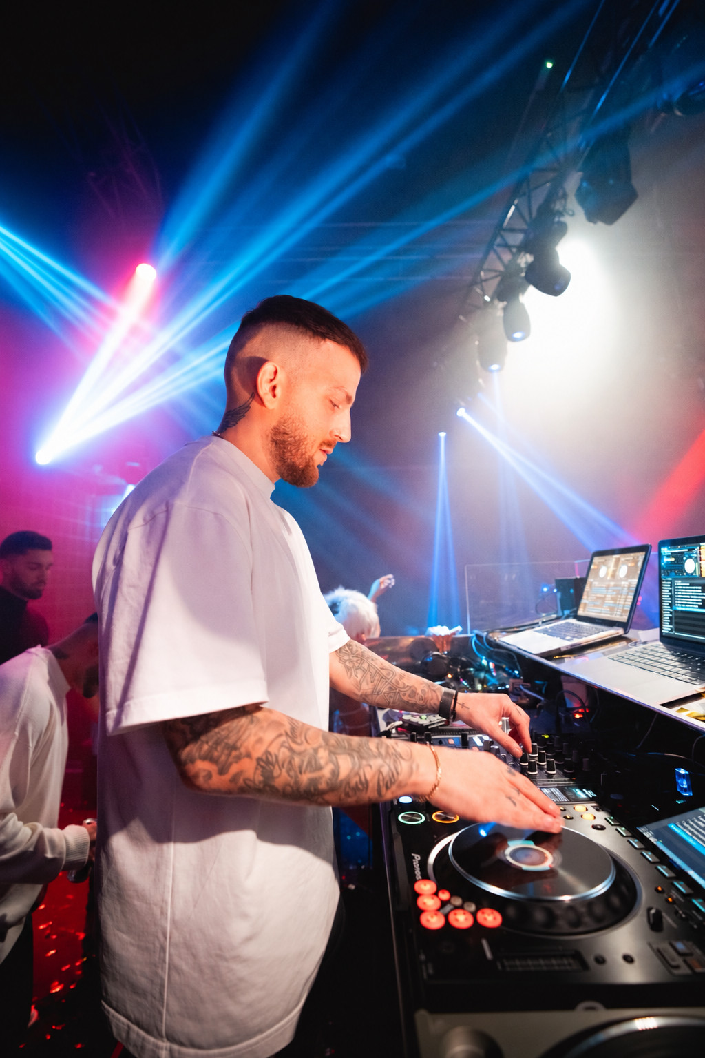 DJ AND-J performing at a club