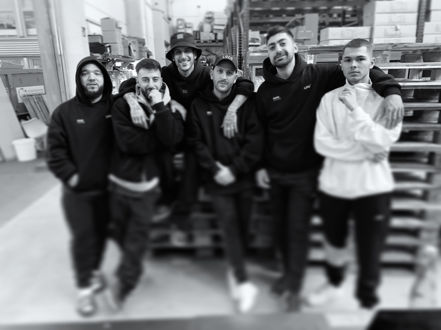 DJ AND-J with a group of artists