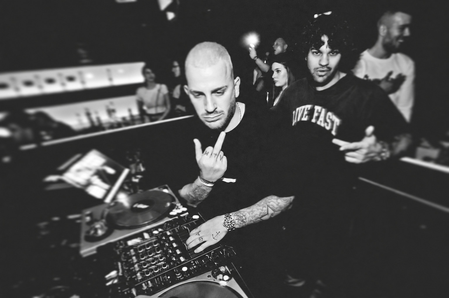 DJ AND-J at the booth with another artist